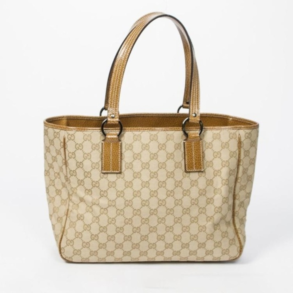 Gucci Tote CanvasMeasurements: 10.4"L x 7.6"W x 3.